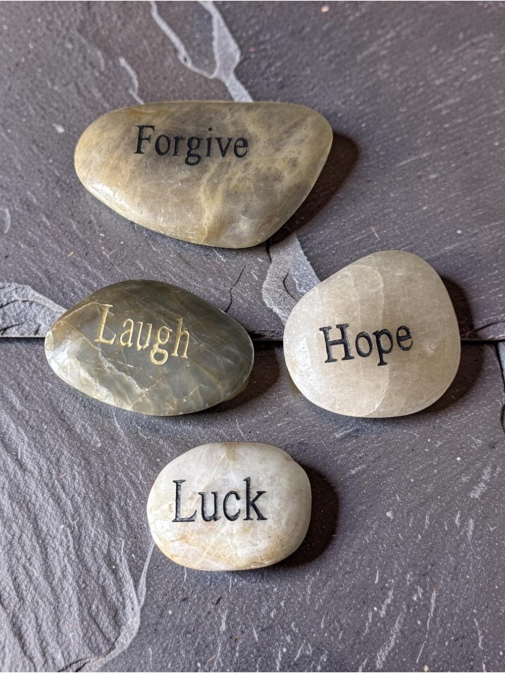 Stones engraved with inspirational words.